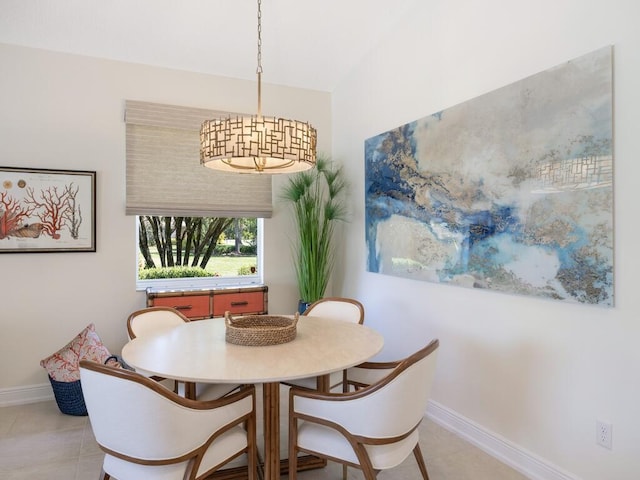 6000 Venetto Way, Vero Beach, FL 32967 - dining area featuring light tile patterned flooring and baseboards