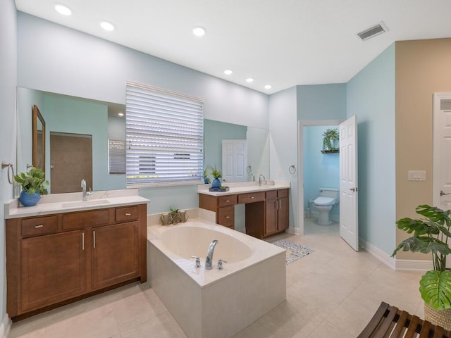 6000 Venetto Way, Vero Beach, FL 32967 - full bathroom featuring toilet, a bath, a sink, and visible vents