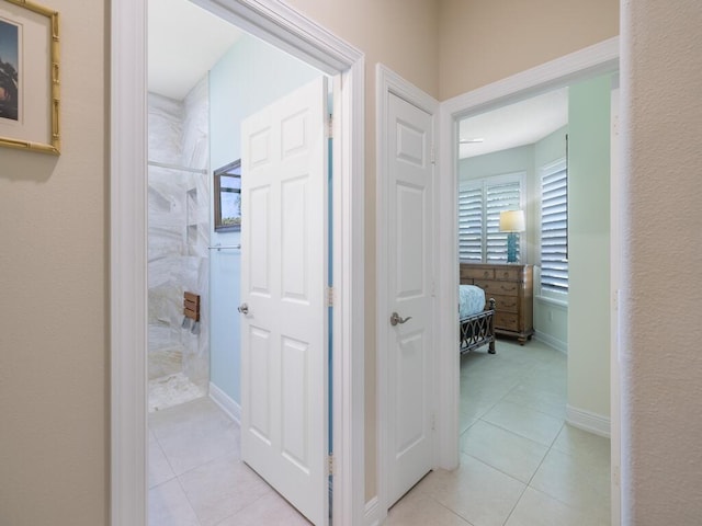6000 Venetto Way, Vero Beach, FL 32967 - hall featuring baseboards and light tile patterned floors