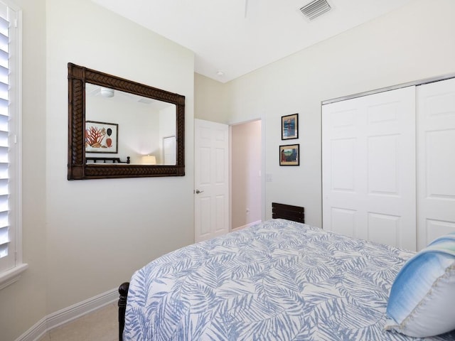 6000 Venetto Way, Vero Beach, FL 32967 - bedroom featuring a closet, visible vents, and baseboards