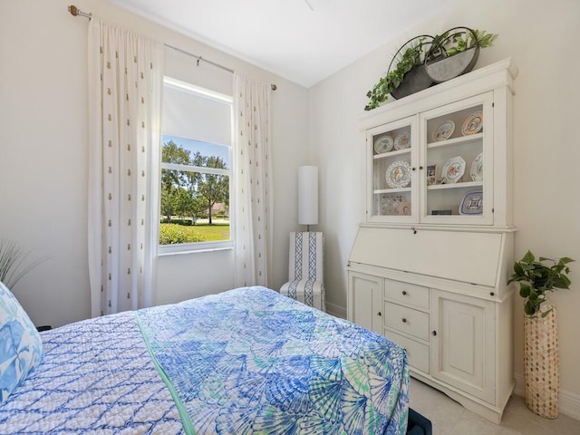6000 Venetto Way, Vero Beach, FL 32967 - bedroom featuring baseboards and light tile patterned floors