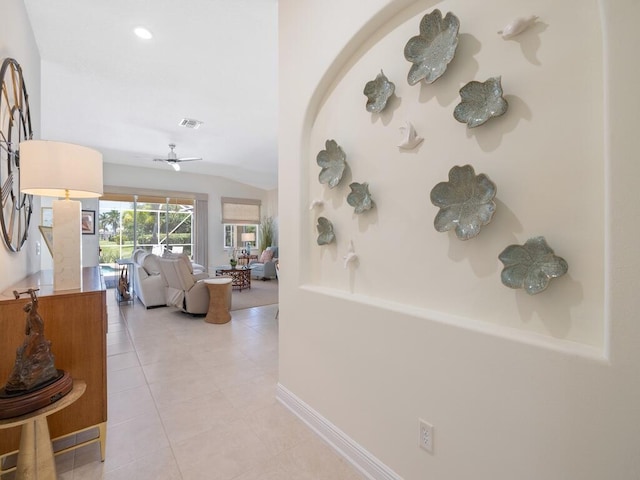 6000 Venetto Way, Vero Beach, FL 32967 - hallway featuring light tile patterned floors, visible vents, and baseboards