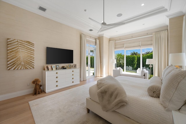 bedroom with crown molding, visible vents, access to exterior, baseboards, and light wood-style floors