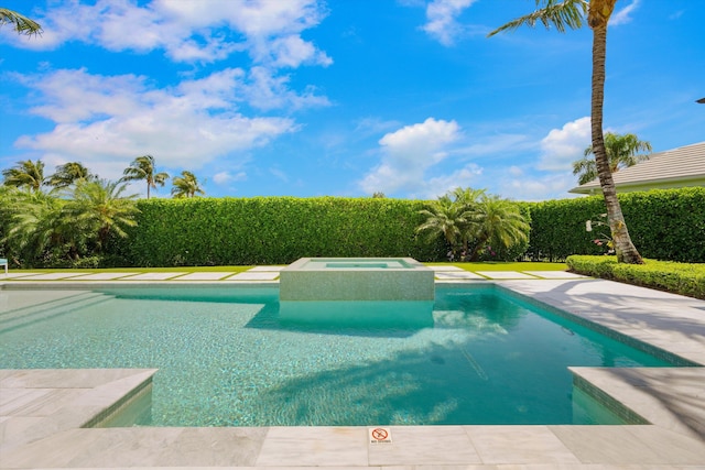 view of swimming pool with an in ground hot tub and a fenced in pool