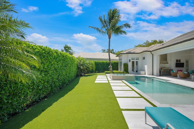 view of pool with a patio and a fenced in pool