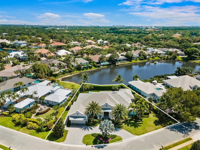 birds eye view of property featuring a residential view and a water view