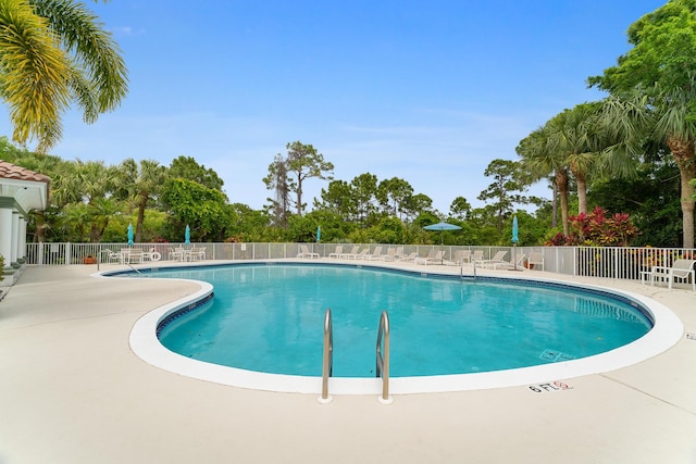 pool featuring fence