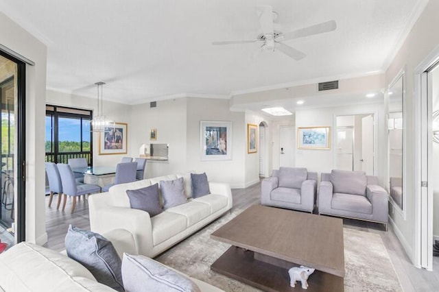 7546 La Paz Blvd Unit 408, Boca Raton, FL 33433 - living room featuring light wood-style flooring, ceiling fan, a chandelier, ornamental molding, and baseboards
