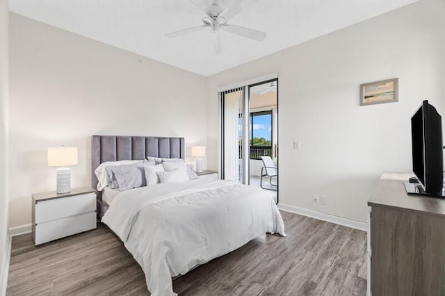 7546 La Paz Blvd Unit 408, Boca Raton, FL 33433 - bedroom with access to exterior, baseboards, wood finished floors, and a ceiling fan