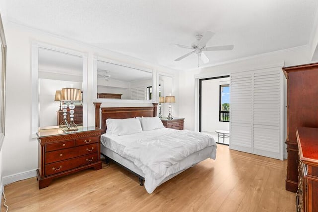7546 La Paz Blvd Unit 408, Boca Raton, FL 33433 - bedroom with access to outside, light wood finished floors, a ceiling fan, ornamental molding, and baseboards