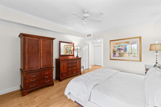 7546 La Paz Blvd Unit 408, Boca Raton, FL 33433 - bedroom with light wood-type flooring, ornamental molding, baseboards, and ceiling fan