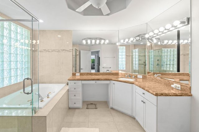 7546 La Paz Blvd Unit 408, Boca Raton, FL 33433 - bathroom featuring tile patterned flooring, vanity, a garden tub, a stall shower, and ceiling fan