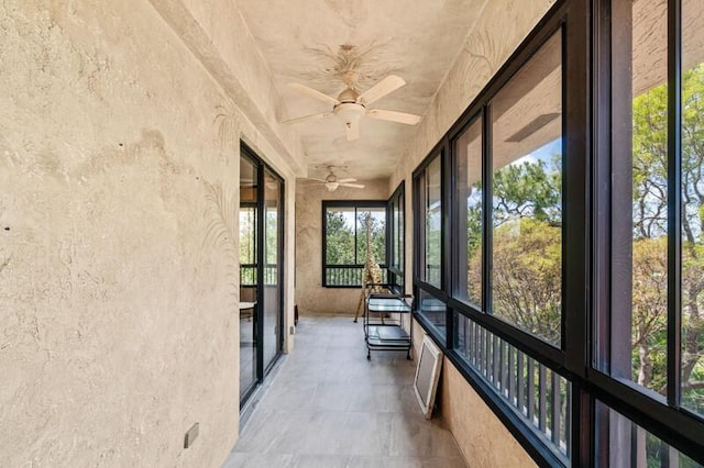 7546 La Paz Blvd Unit 408, Boca Raton, FL 33433 - unfurnished sunroom with a ceiling fan and plenty of natural light