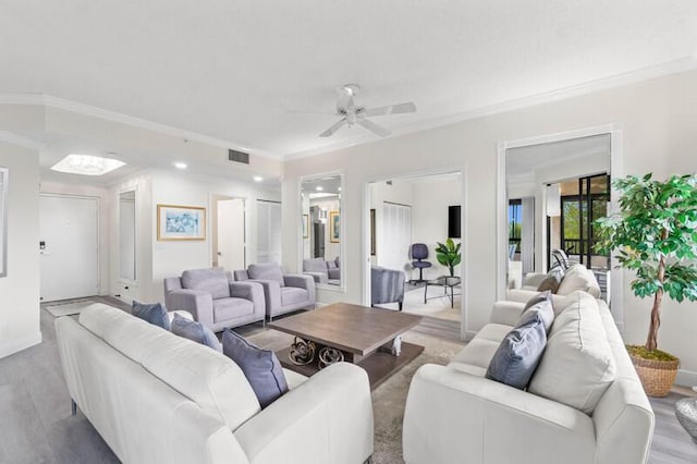 7546 La Paz Blvd Unit 408, Boca Raton, FL 33433 - living room featuring crown molding, light wood finished floors, ceiling fan, and baseboards