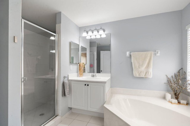 453 Rainbow Springs Ter, Royal Palm Beach, FL 33411 - full bathroom featuring a stall shower, tile patterned flooring, a bath, and vanity