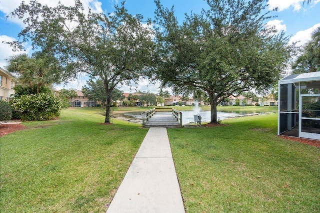 453 Rainbow Springs Ter, Royal Palm Beach, FL 33411 - view of grassy yard with a water view and a residential view