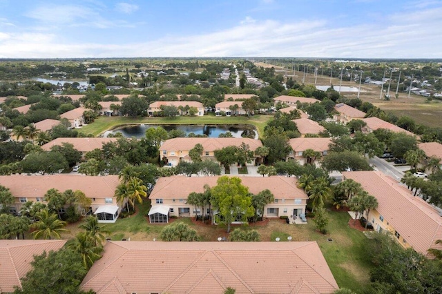 453 Rainbow Springs Ter, Royal Palm Beach, FL 33411 - aerial perspective of suburban area featuring a nearby body of water