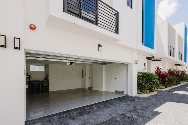 garage featuring a garage door opener