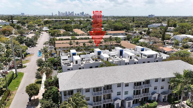 drone / aerial view featuring a city view