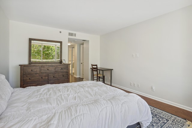 4201 N Ocean Blvd Unit 208, Boca Raton, FL 33431 - bedroom featuring baseboards, visible vents, and dark wood finished floors