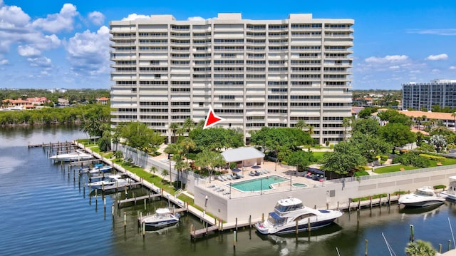 4201 N Ocean Blvd Unit 208, Boca Raton, FL 33431 - view of building exterior featuring a water view and fence
