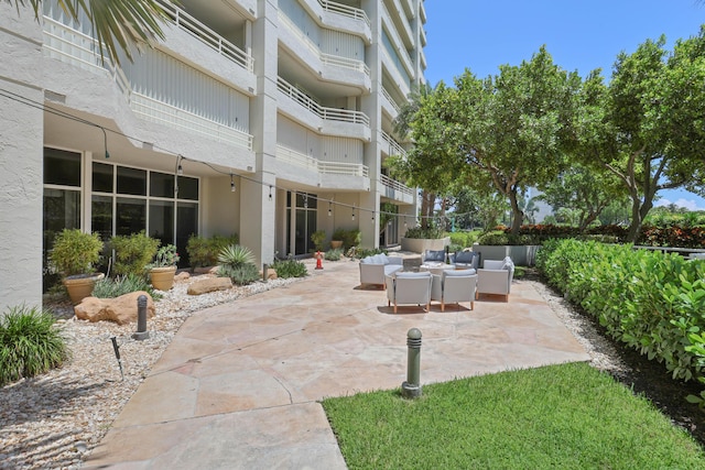 4201 N Ocean Blvd Unit 208, Boca Raton, FL 33431 - view of patio featuring an outdoor hangout area