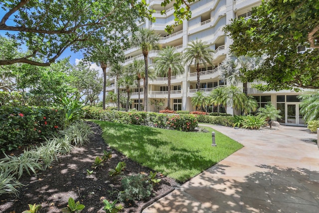 4201 N Ocean Blvd Unit 208, Boca Raton, FL 33431 - view of community with a lawn