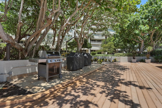 4201 N Ocean Blvd Unit 208, Boca Raton, FL 33431 - wooden deck with fence and grilling area