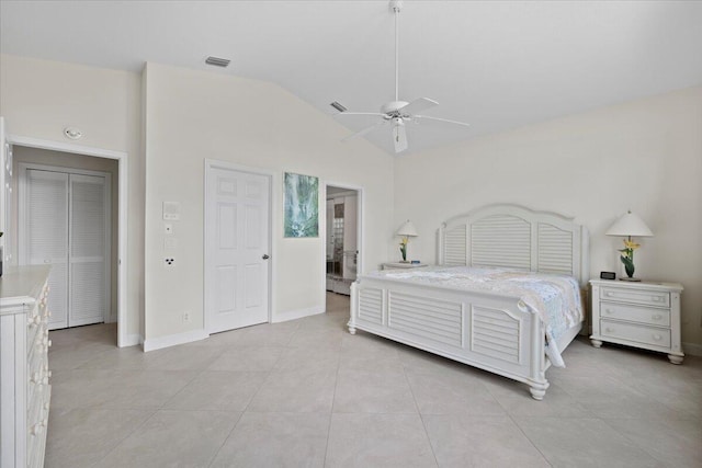 bedroom featuring a ceiling fan, visible vents, baseboards, lofted ceiling, and light tile patterned flooring