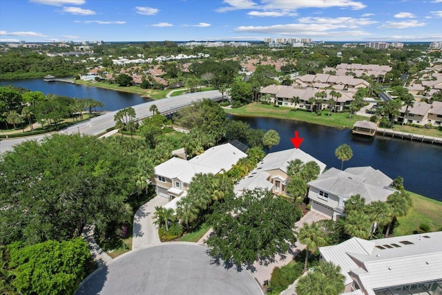 bird's eye view with a residential view and a water view