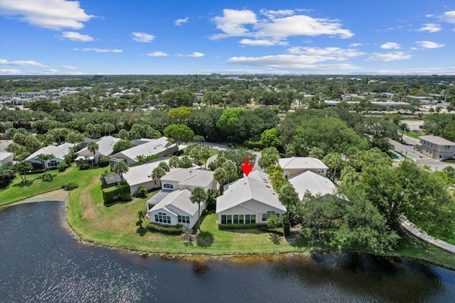 aerial view with a residential view and a water view