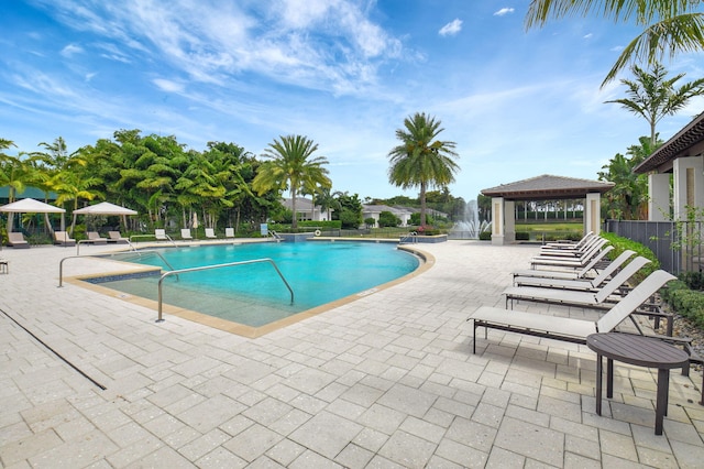 7339 NW 28th Way, Boca Raton, FL 33496 - pool featuring fence, a gazebo, and a patio area