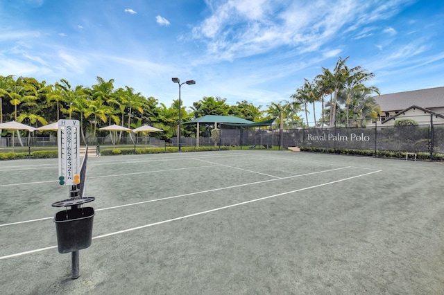 7339 NW 28th Way, Boca Raton, FL 33496 - view of tennis court featuring fence