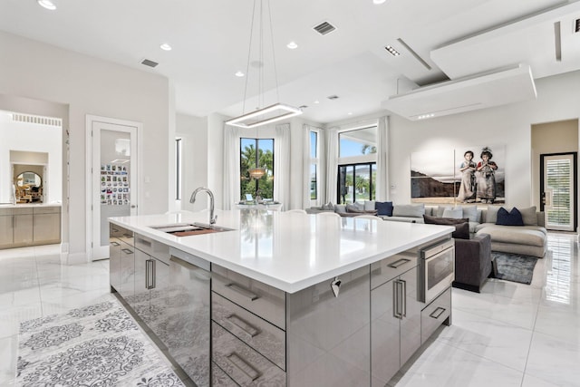 7339 NW 28th Way, Boca Raton, FL 33496 - kitchen with a sink, appliances with stainless steel finishes, modern cabinets, marble finish floor, and gray cabinets