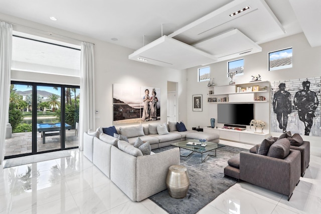 7339 NW 28th Way, Boca Raton, FL 33496 - living room with a healthy amount of sunlight, marble finish floor, and a high ceiling