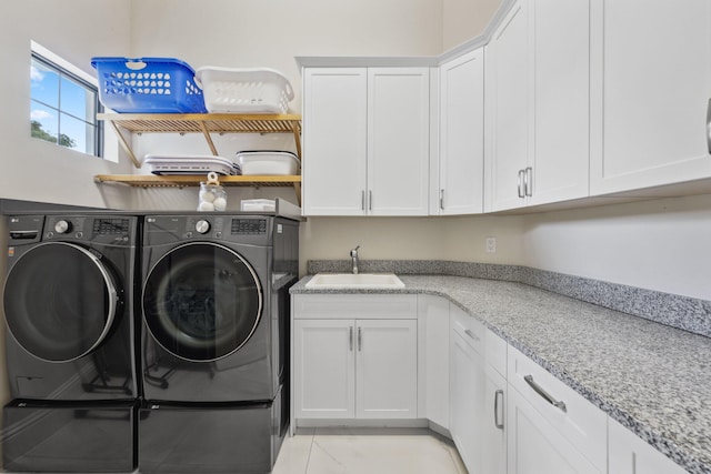 7339 NW 28th Way, Boca Raton, FL 33496 - washroom with washing machine and dryer, a sink, and cabinet space