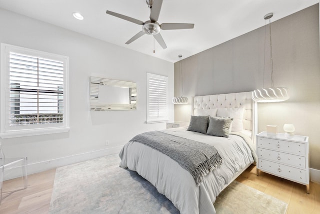 7339 NW 28th Way, Boca Raton, FL 33496 - bedroom featuring recessed lighting, a ceiling fan, wood finished floors, and baseboards