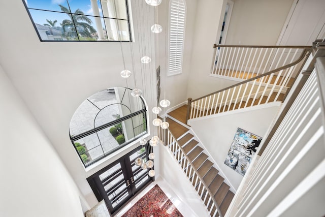 7339 NW 28th Way, Boca Raton, FL 33496 - staircase with wood finished floors