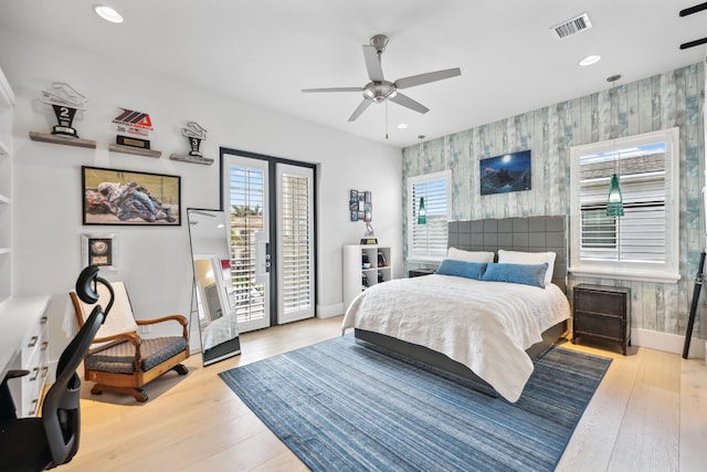 7339 NW 28th Way, Boca Raton, FL 33496 - bedroom with visible vents, wallpapered walls, access to outside, baseboards, and an accent wall
