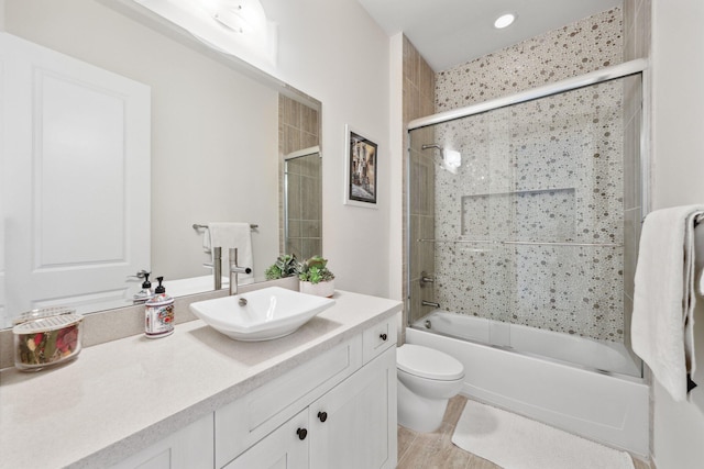 7339 NW 28th Way, Boca Raton, FL 33496 - bathroom featuring enclosed tub / shower combo, toilet, recessed lighting, and vanity