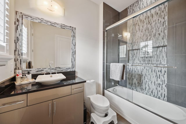 7339 NW 28th Way, Boca Raton, FL 33496 - full bath with combined bath / shower with glass door, vanity, and toilet