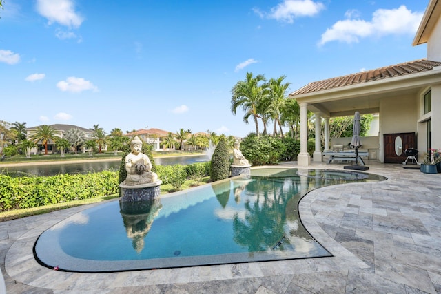 7339 NW 28th Way, Boca Raton, FL 33496 - pool featuring a patio area and a water view