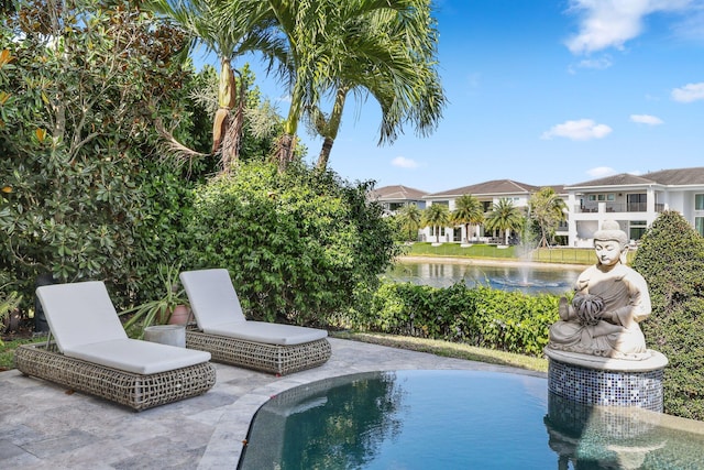 7339 NW 28th Way, Boca Raton, FL 33496 - view of swimming pool with a patio area, a water view, and a residential view
