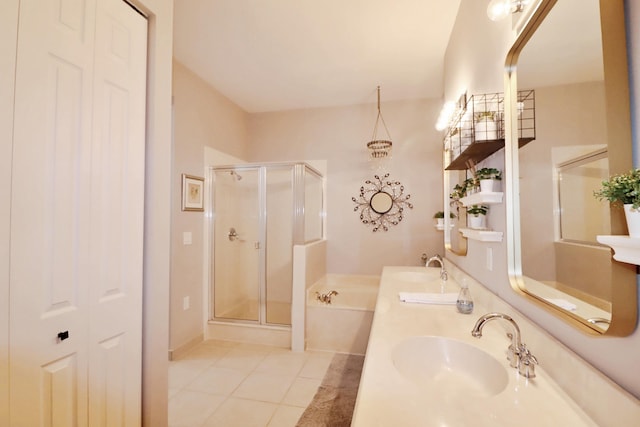 10520 SW Stephanie Way Unit 2204, Port Saint Lucie, FL 34987 - full bath with tile patterned flooring, a garden tub, double vanity, a shower stall, and a sink