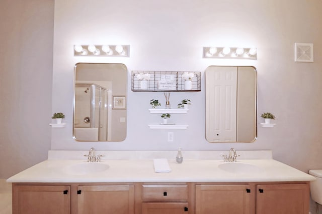 10520 SW Stephanie Way Unit 2204, Port Saint Lucie, FL 34987 - full bath with double vanity, toilet, a shower with door, and a sink