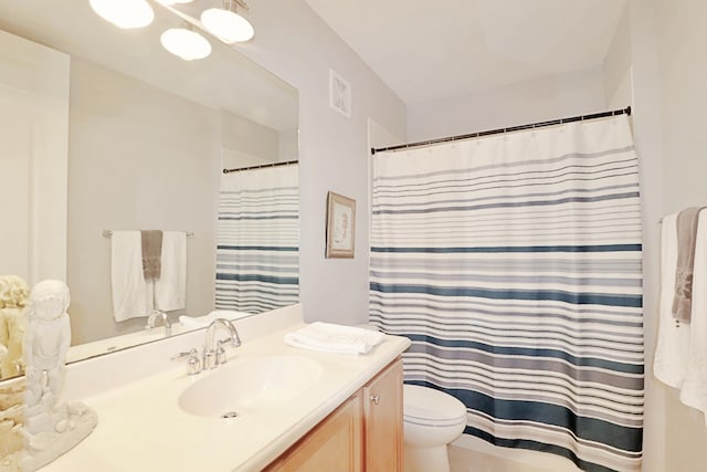 10520 SW Stephanie Way Unit 2204, Port Saint Lucie, FL 34987 - bathroom featuring vanity, a shower with curtain, toilet, and visible vents