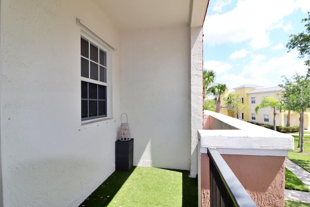 10520 SW Stephanie Way Unit 2204, Port Saint Lucie, FL 34987 - view of home's exterior with stucco siding and a balcony