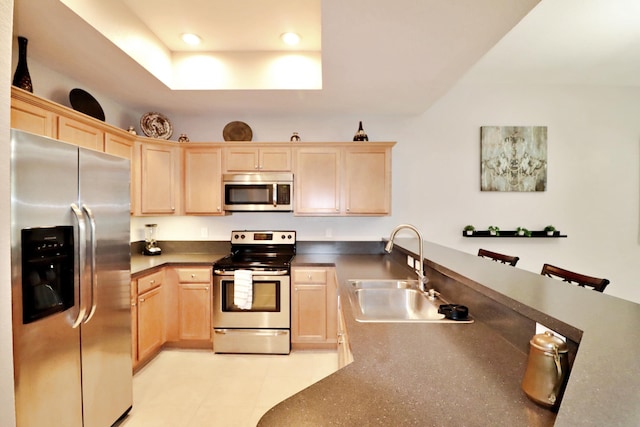 10520 SW Stephanie Way Unit 2204, Port Saint Lucie, FL 34987 - kitchen with a sink, appliances with stainless steel finishes, and light brown cabinets
