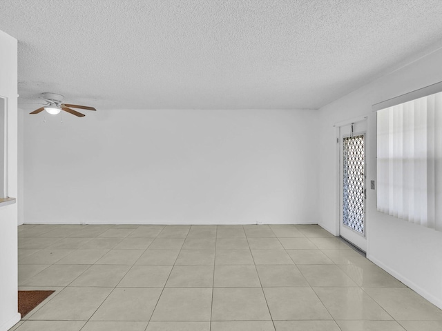 271 Tilford M Unit 271, Deerfield Beach, FL 33442 - empty room featuring a textured ceiling and a ceiling fan
