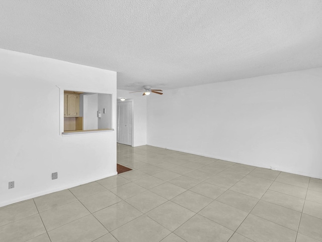 271 Tilford M Unit 271, Deerfield Beach, FL 33442 - empty room with a textured ceiling and ceiling fan